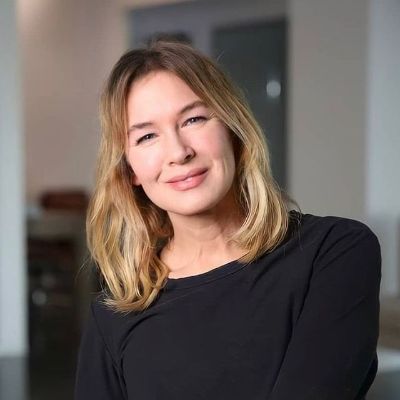 She has her shoulder tilted in the picture.